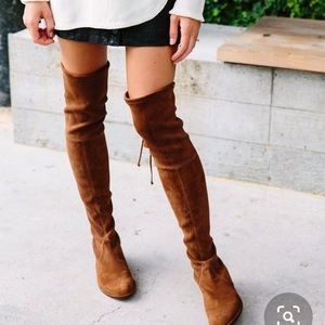 Over the knee flat boots